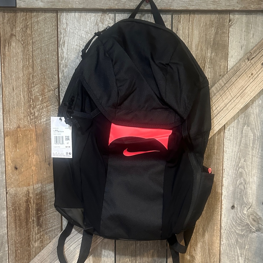 Nike Black Backpack with Bright Pink Logo Accent